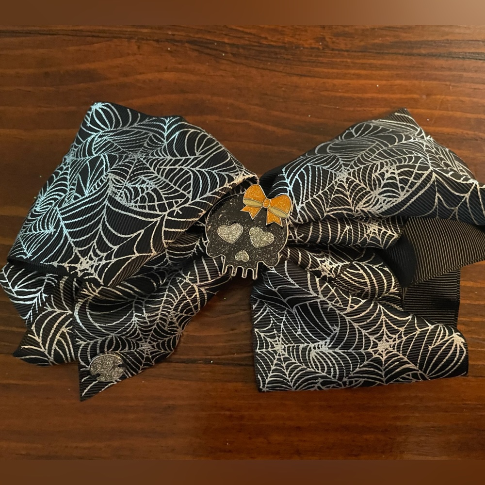 Jojo Siwa Black Halloween Skull and Web Bow hair clip.
